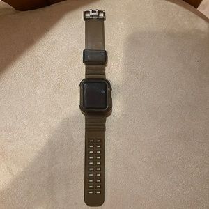 Series 1 Apple Watch with charcoal gray rubber band (Charger not included)
